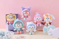 sonic x sanrio plushes sitting together.